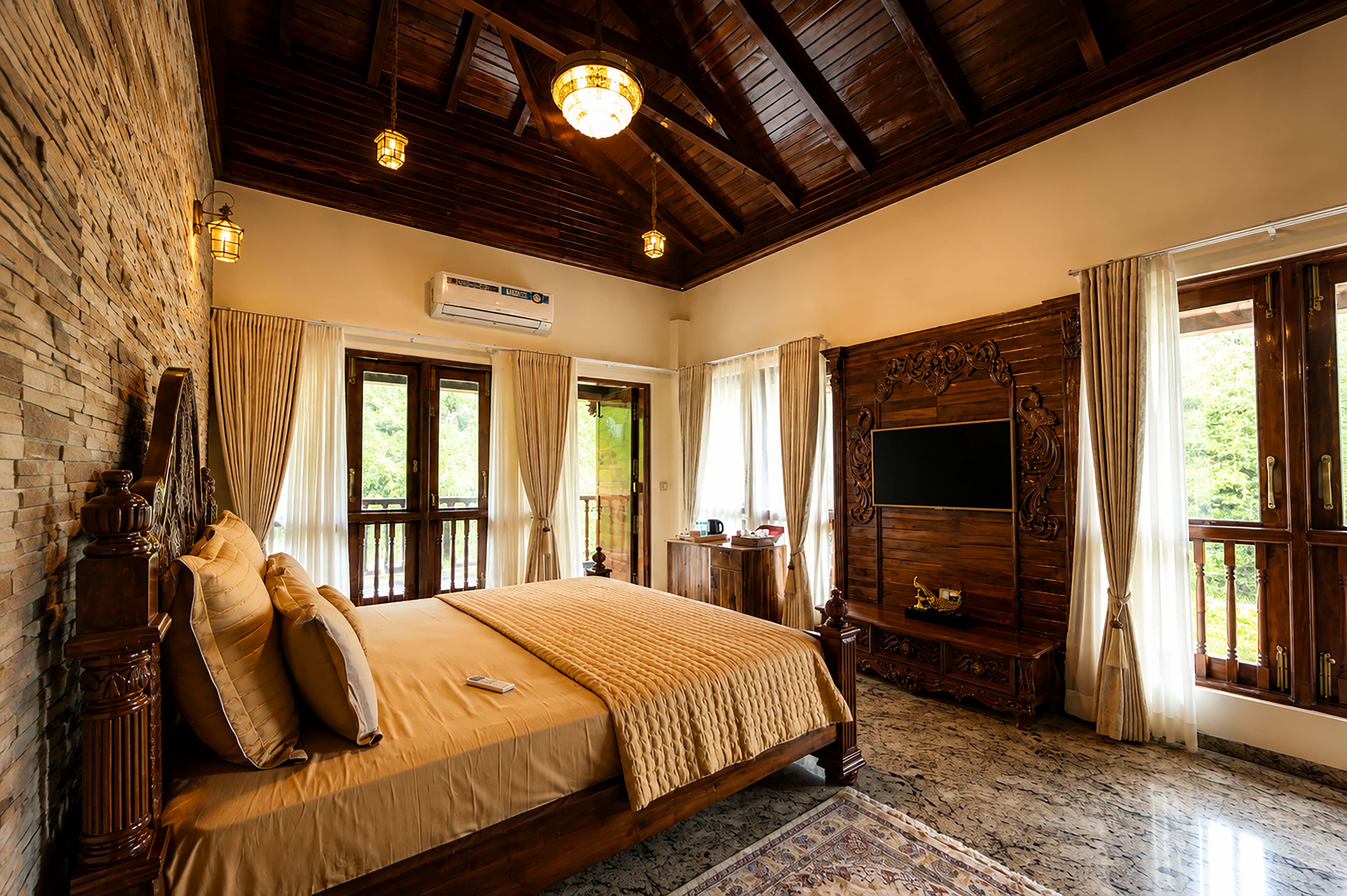 Bedroom with tall curtained windows